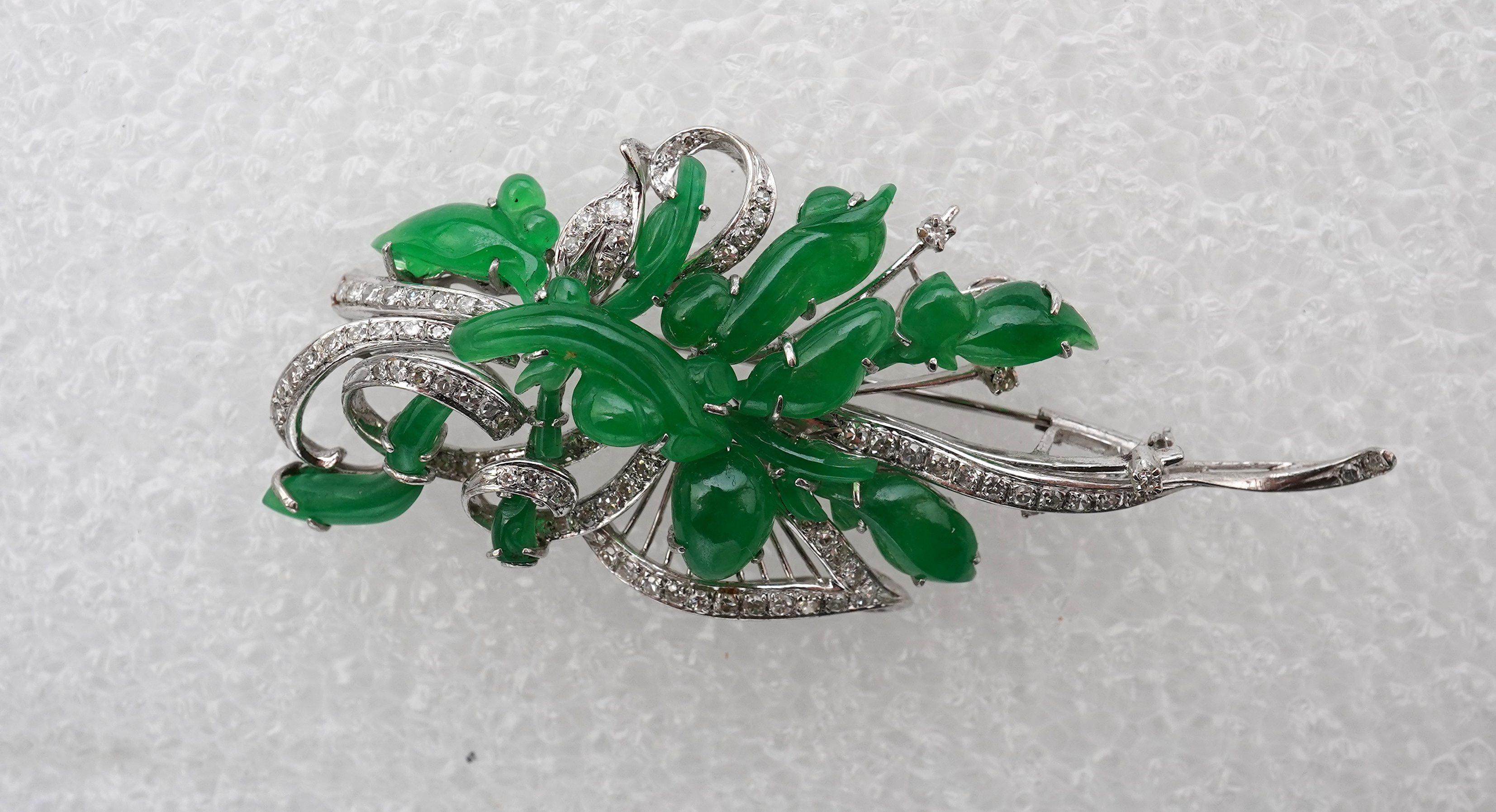 A fine jadeite and diamond brooch, 1960s